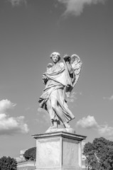 Stone statues of angels and apostles Eliyev on the bridge over the River Tiber leading to Castel Sant'Angelo in Rome, capital of Italy near the Vatican