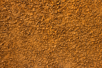 Decorative yellow plaster of a wall