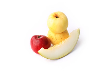 melon and apple isolated on a white background