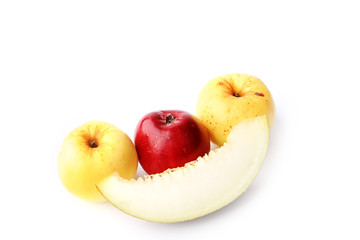 melon and apple isolated on a white background