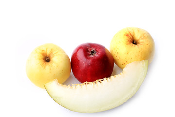 melon and apple isolated on a white background