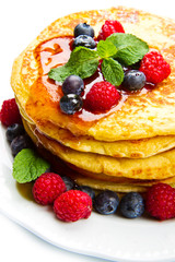 deliciuos pancake with fresh fruit on white