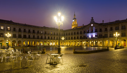 Fototapeta na wymiar Evening view of New Square and city hall. Vitoria-Gasteiz