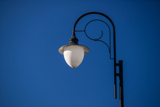Street latern with white lamp.