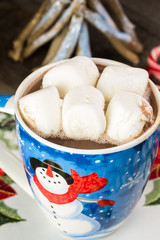 Christmas mug with hot chocolate and marshmallows.