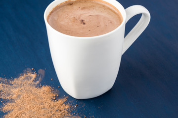 White mug with hot chocolate.