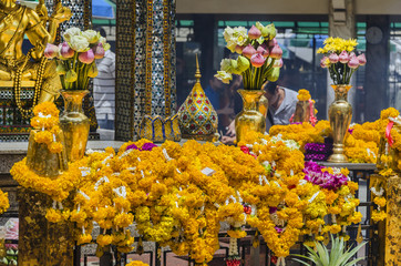 BANGKOK - 3 July 2014 : People pray respect the shrine of the four-faced Brahma statue at Ratchaprasong Junction on July 3, 2014 in Bangkok,Thailand.