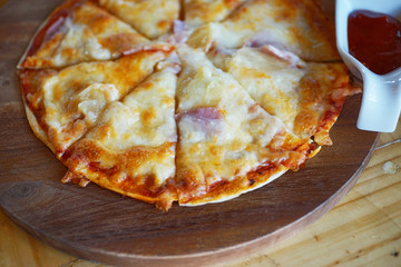 soft focus of  pizza on wood, homemade