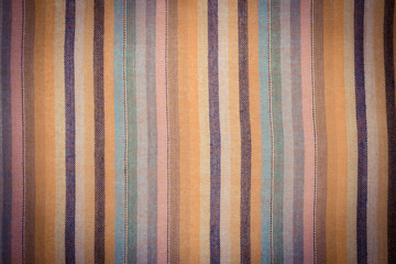 Vintage photo, Striped colorful shawl as background texture