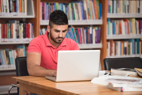 Male College Student Stressed About His Homework