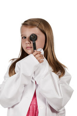 Child doctor with an otoscope