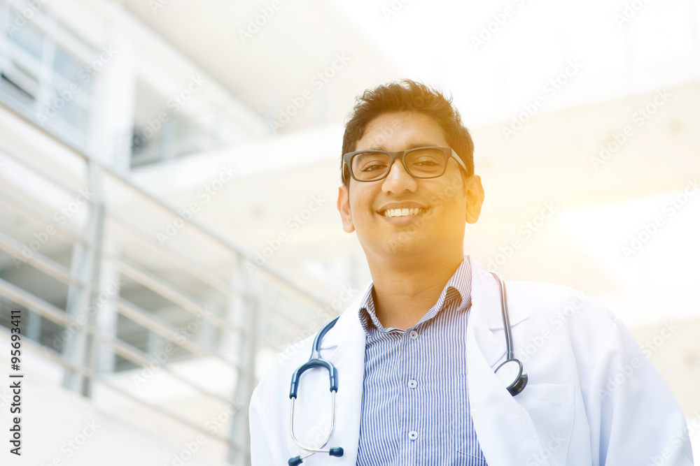 Wall mural Asian Indian medical doctor smiling