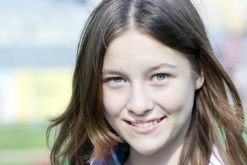 Summer portrait of happy smiling teen girl 