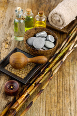 frangipani and dry bamboo grove, stones,towel ,oil on old wood

