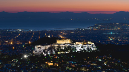Fototapeta premium Greek landscape of Acropolis against the sunset. 