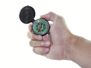 hand holding a compass