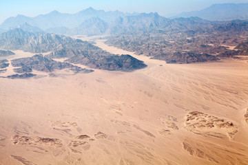 Fototapeta na wymiar The Horeb mountains in Egypt on Sinai Peninsula with Sahara desert, aerial view