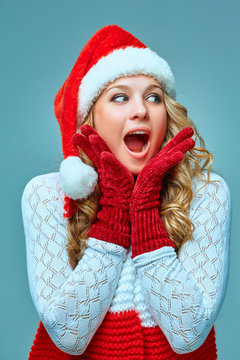 portrait of girl dressed in santa hat 