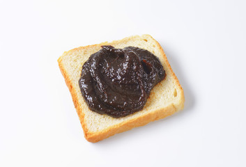 White bread with plum jam