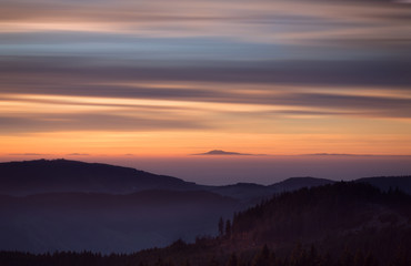 sunset over fog in Black Forest, Germany