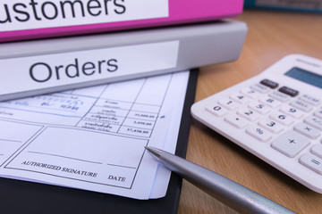 Signature field on document with pen and file