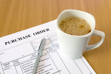 cup of coffee on purchase order form
