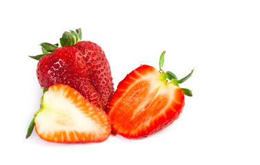 big red juicy rich strawberries with pedicle on white backgrond
