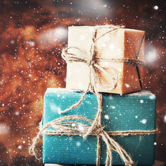 Two Holiday Boxes. Gifts and Natural Twine. Snow Drawn