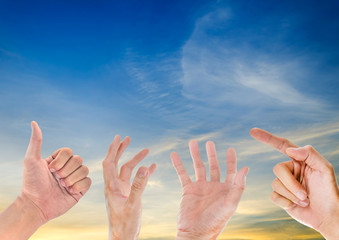 hands with sky background