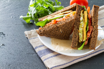 Vegan sandwich with salad and cheese