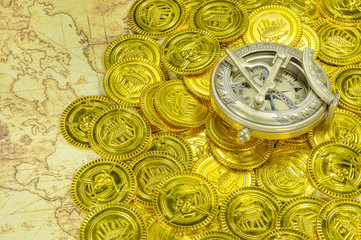 compass on a pirate golden coin