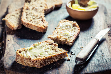 Fototapeta na wymiar Healthy loaf of bread with several grains for breakfast