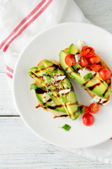  sandwiches with avocado and tomatoes