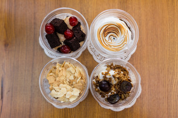 Creamy dessert in plastic cup