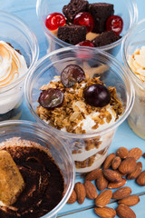 Creamy dessert in plastic cup