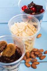 Creamy dessert in plastic cup