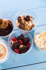 Creamy dessert in plastic cup