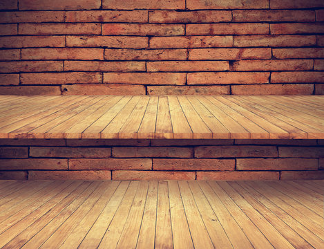 wooden floor and shelves on old brick wall texture for background