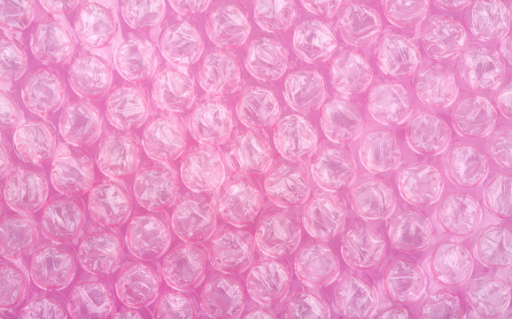 Premium Photo  Pink plastic wrap air bubble texture background