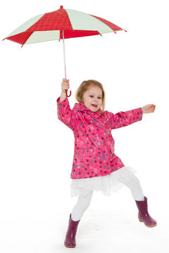 Little girl with umbrella.