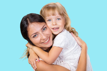 Happy mother and child girl