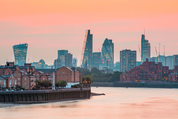 LONDON, UK - SEPTEMBER 9, 2015:  City of London business and banking aria at sunset. Panoramic view 