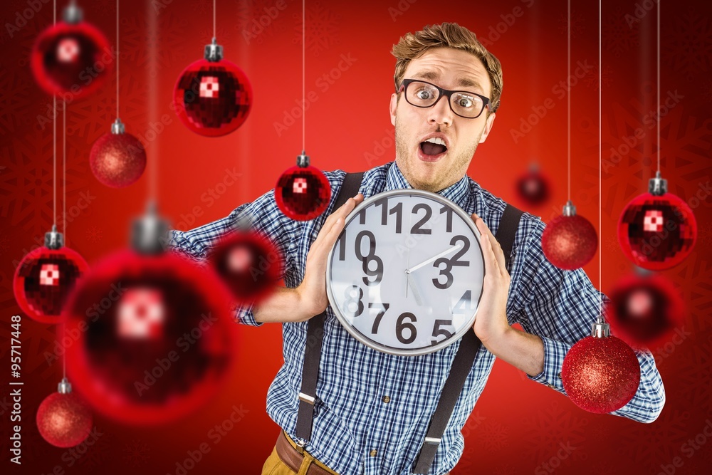 Poster composite image of geeky businessman holding a clock