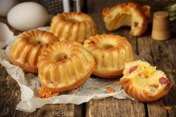 Muffins with cheese, selective focus