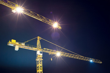 cranes and illumination at night