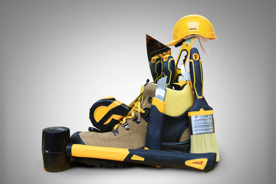 Shoe construction with tools and construction helmet