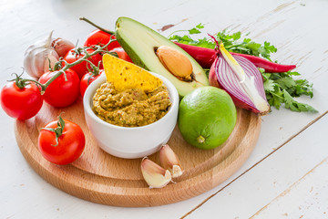 Guacamole sauce and ingredients