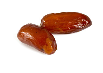 dried dates isolated on white