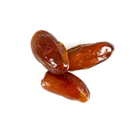 dried dates isolated on white