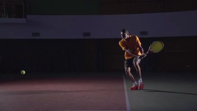 Tennis shots: Backhand (slow motion). Professional tennis player